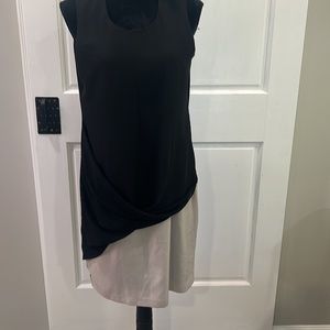 DKNYC size 8 fully lined dress with decorative front. Excellent condition.